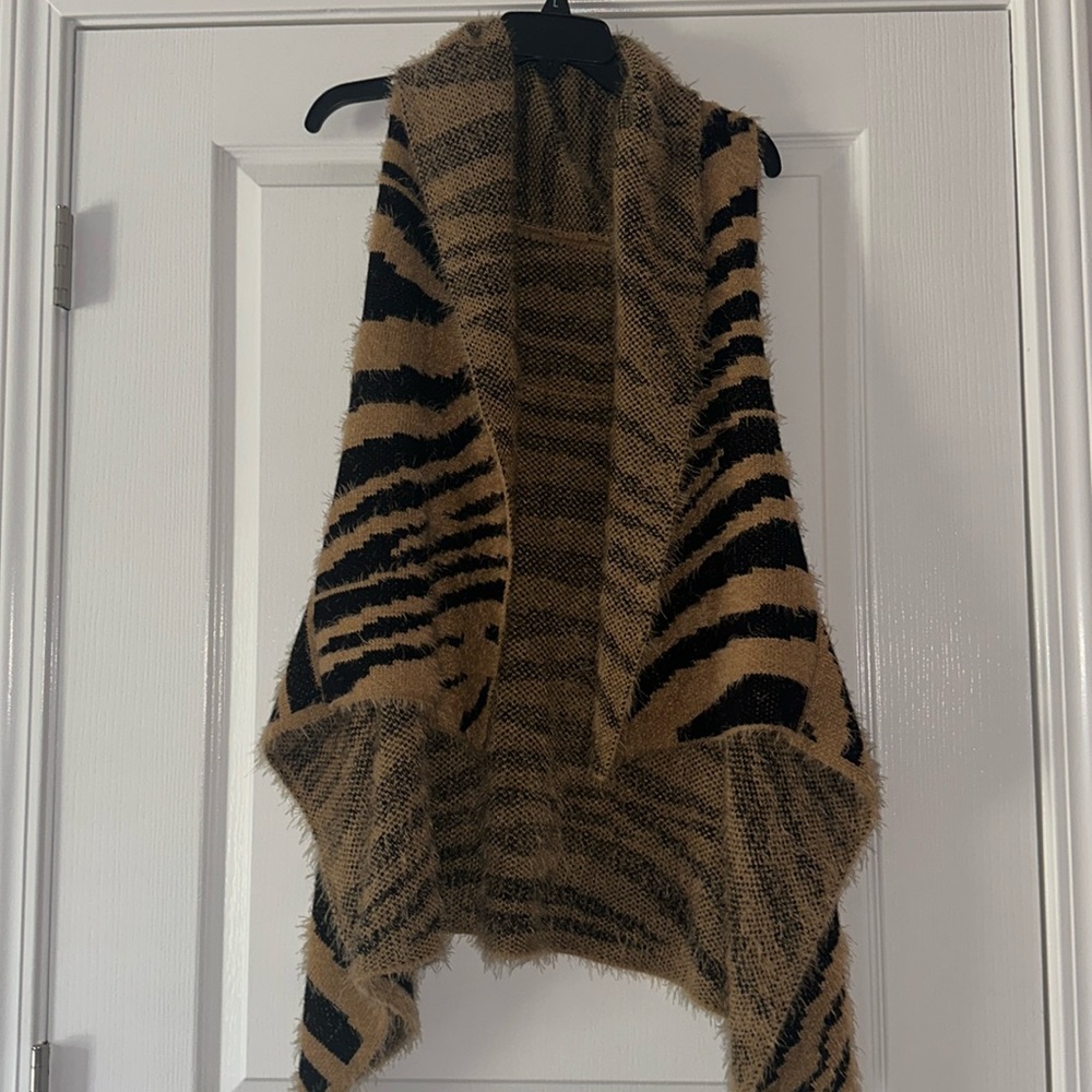 Fuzzy Animal print vest. One size. Brown and black.